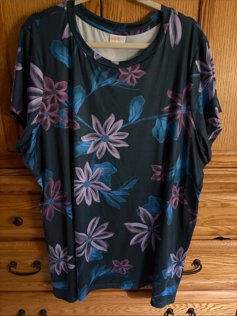 LuLaRoe Black Tee with Blue and Lavender Floral Print
